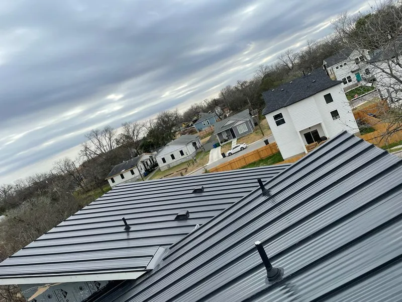 Standing seam metal roof panels with vents for Skylight Repair in Todd Creek